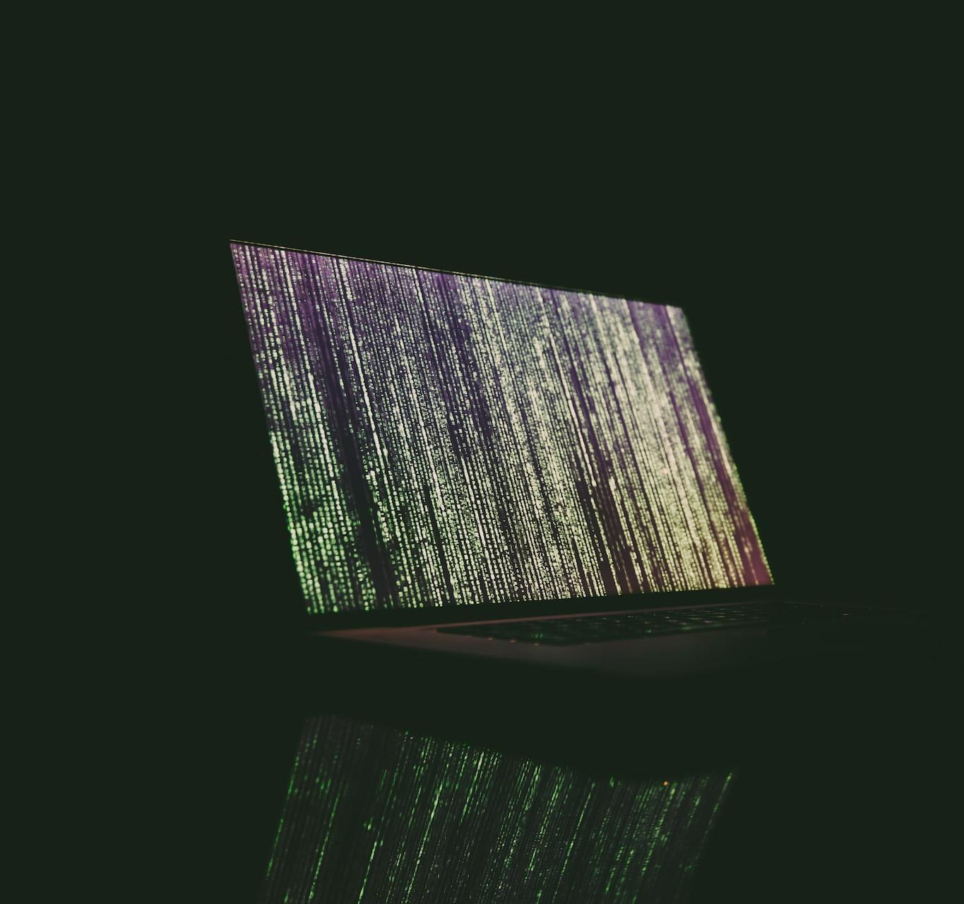 turned on laptop on table